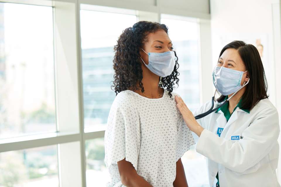 Doctor examining patient